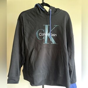 Calvin Klein sweatshirt, nice detailing, one blue sleeve trim, blue stitch